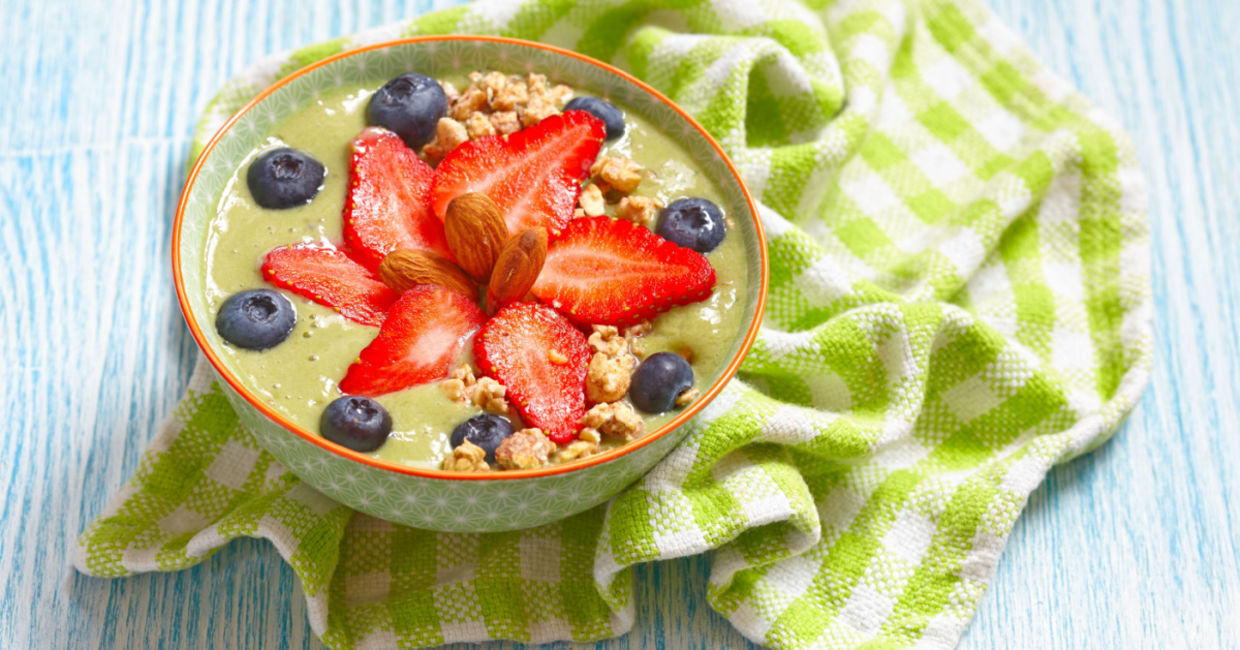Healthy breakfast contains matcha, yogurt, and fruit.
