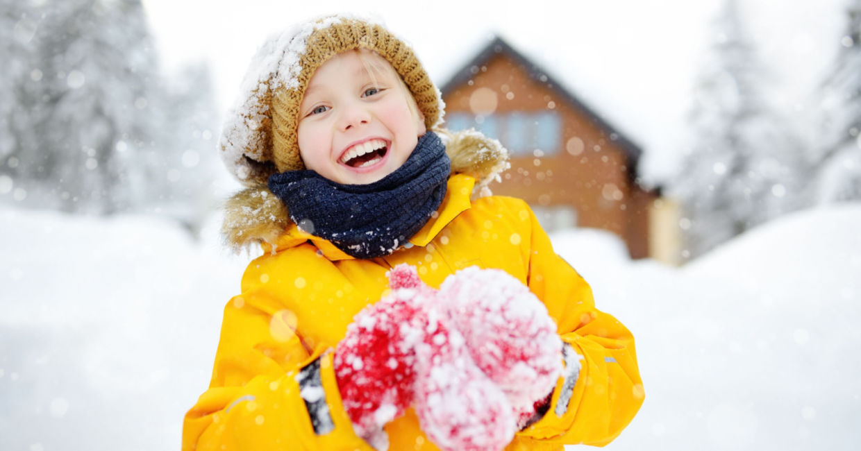 Child playing outside during the winter.