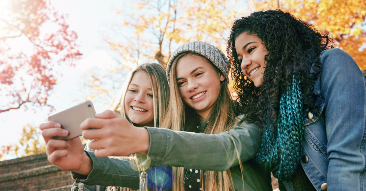 GenZ friends posting on social media.