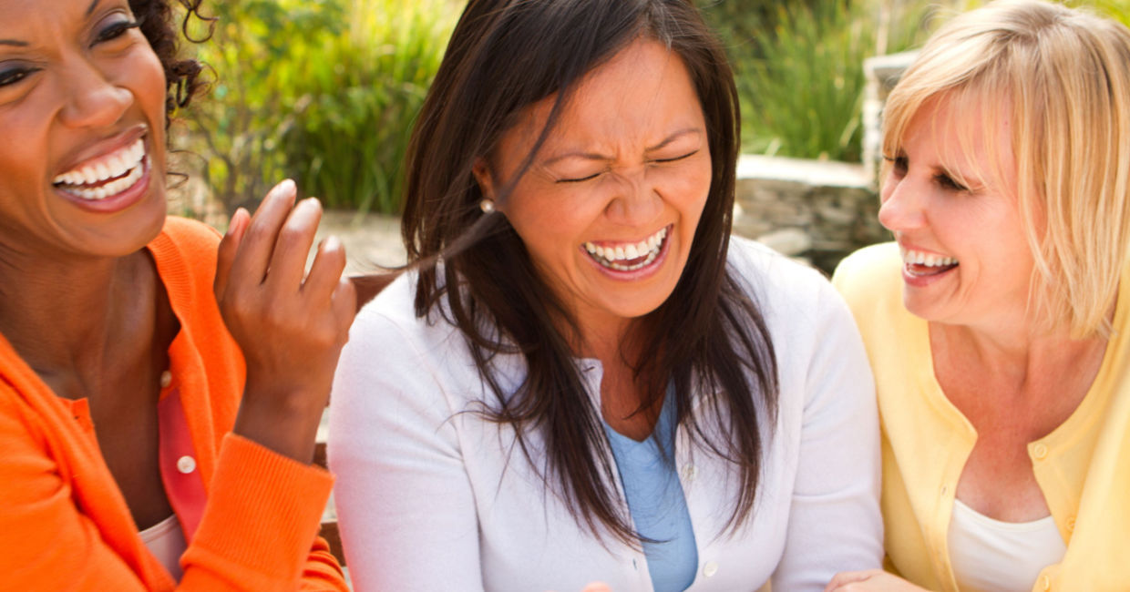 Group of friends laughing.