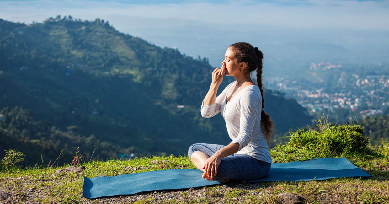 Woman practicing breathe control.