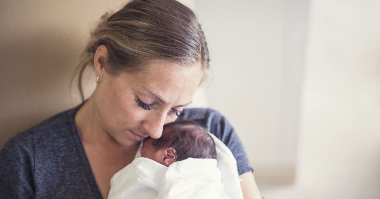 Cuddling a premature infant.