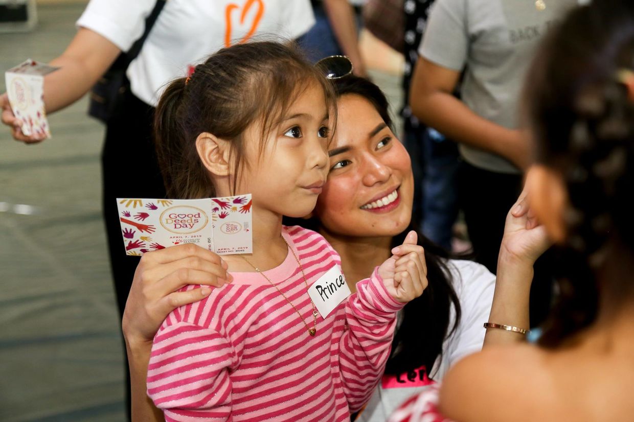 Celebrating at the Good Deeds Day carnival in Manila
