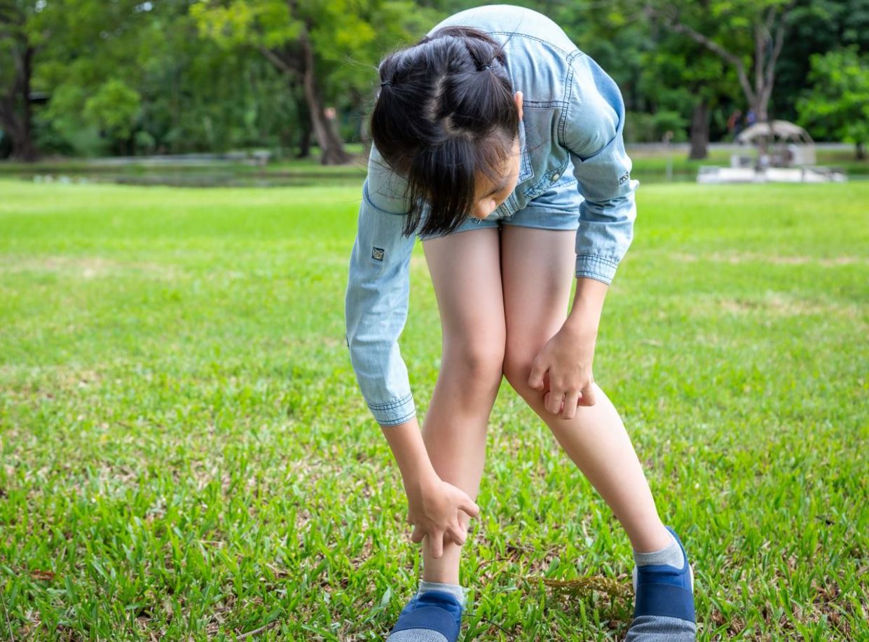 scratching itchy mosquito bites.