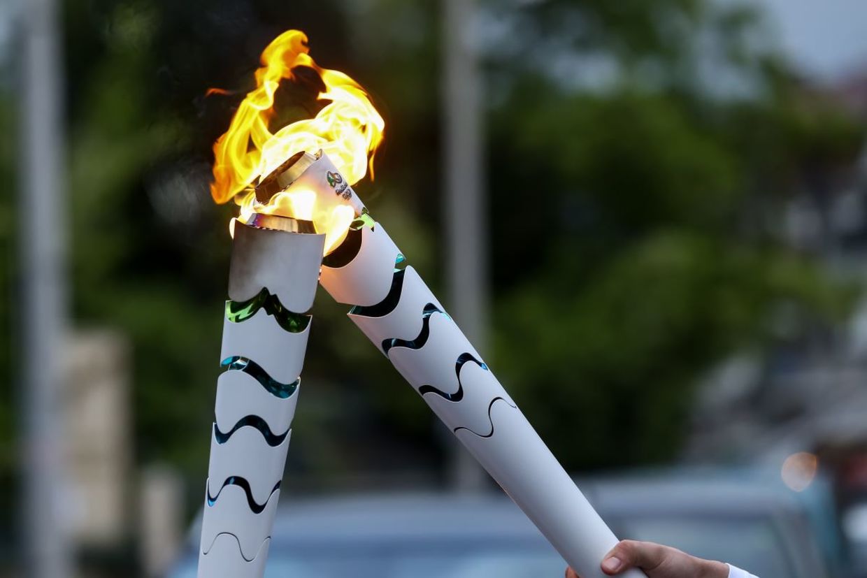 Olympic torch handover.