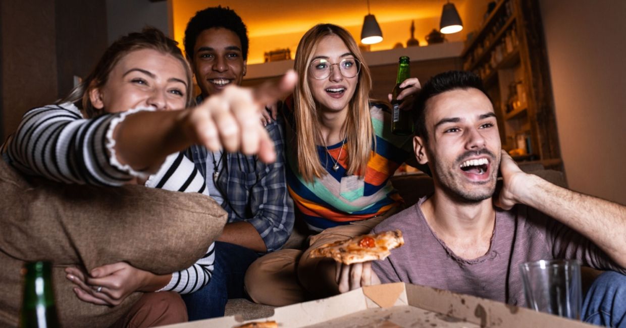 Friends watching TV.