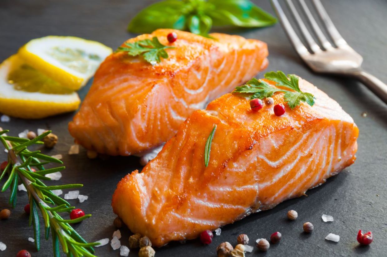 Eating salmon for dinner could help you sleep better.