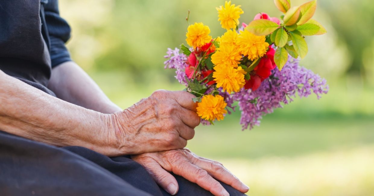 Bringing flowers to a senior neighbor.