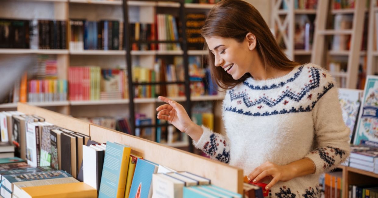 Woman browsing books.