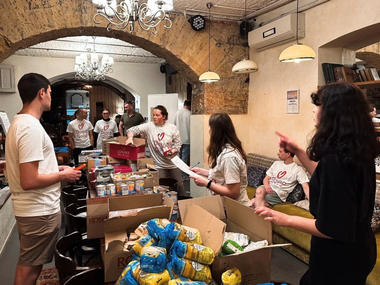 Volunteers in Odessa are packing food boxes for people in need.