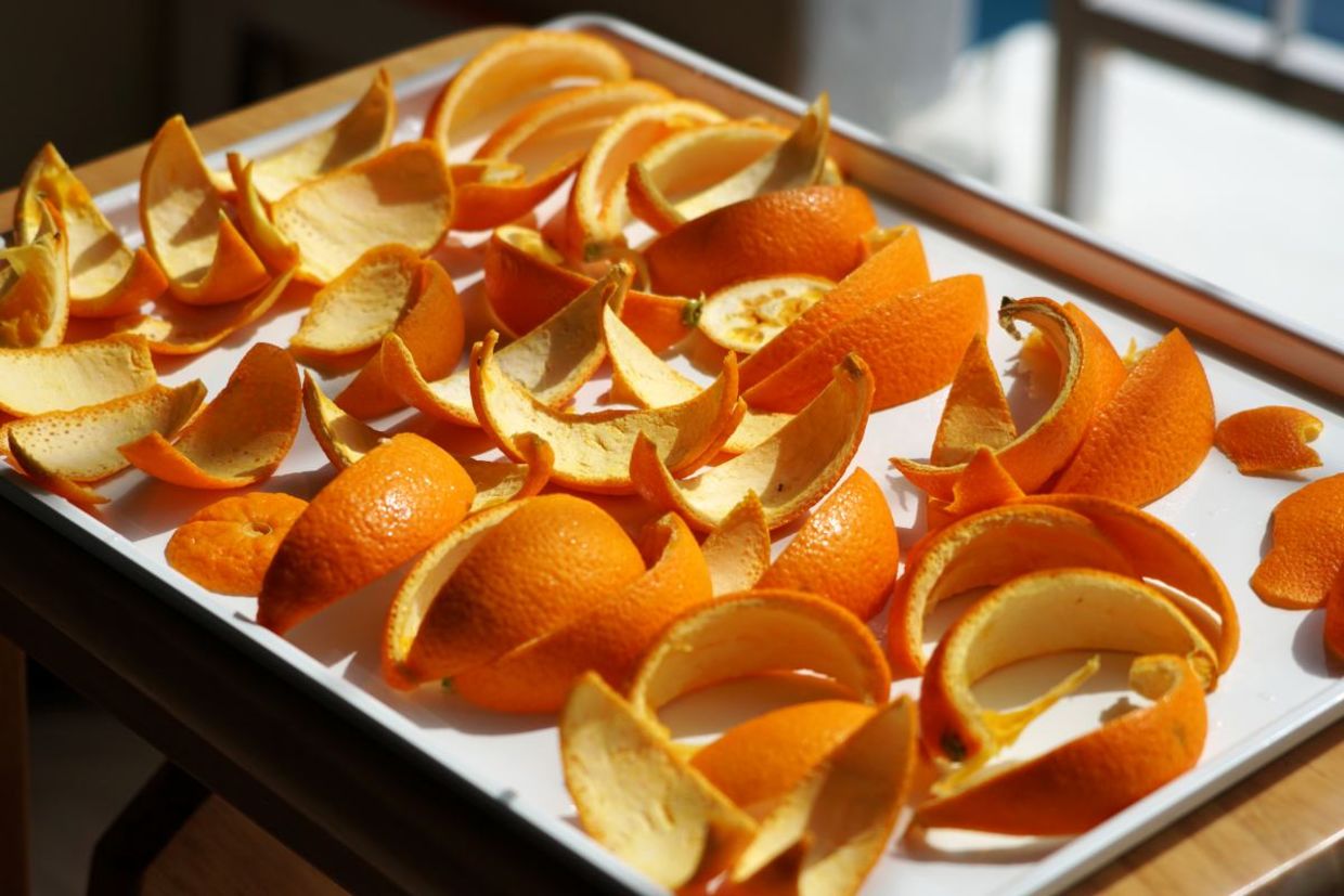 Making candied orange peels.