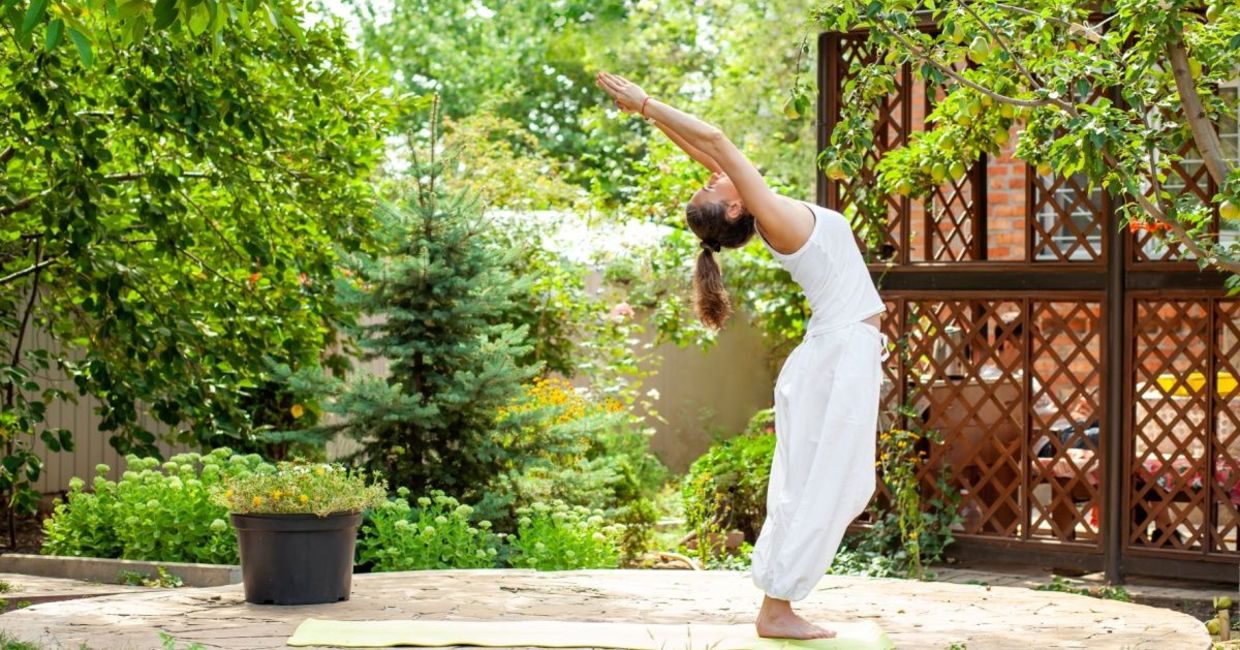 Stand tall and reach for the sky in the mountain yoga pose.