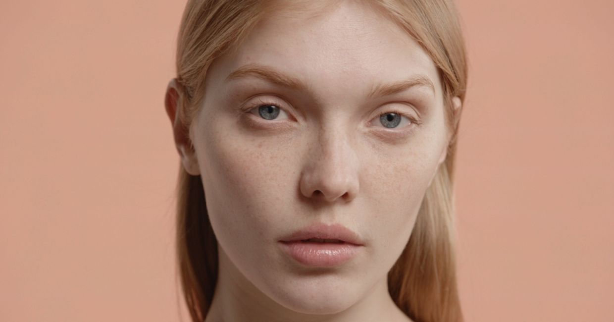 Beautiful young woman with no makeup.