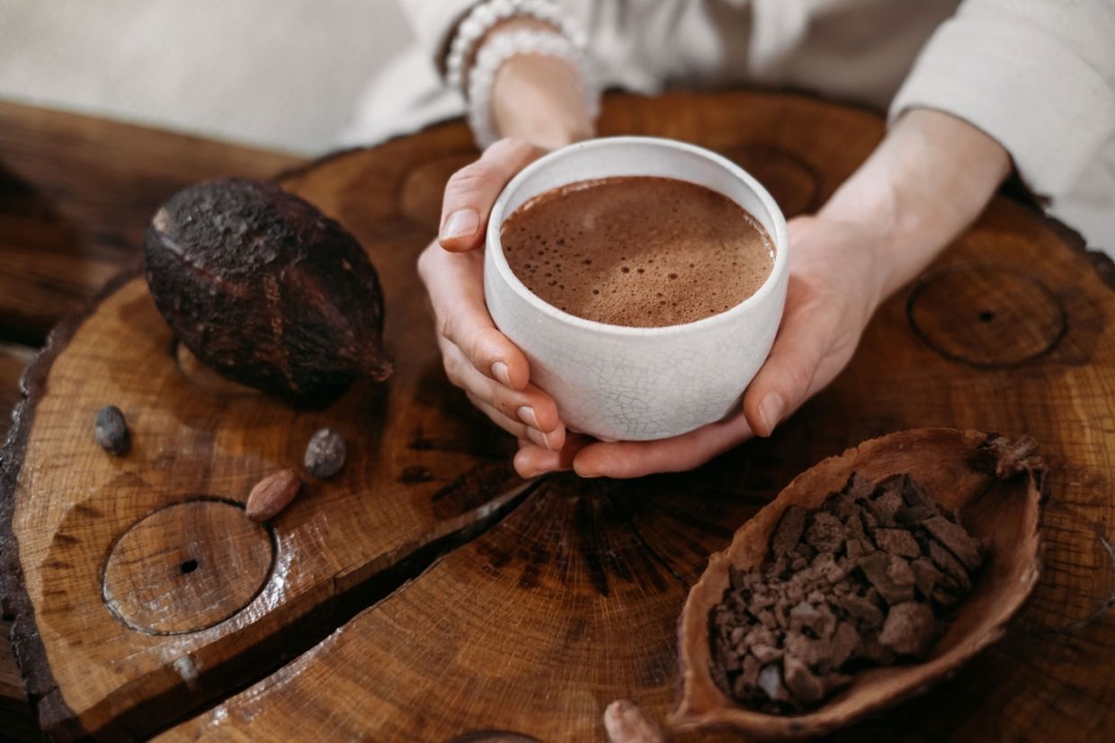 Ceremonial cacao in white cup.