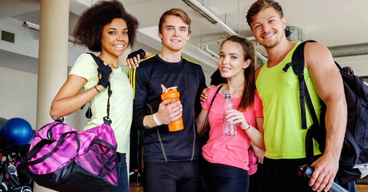 A group of friends in an aerobics class.