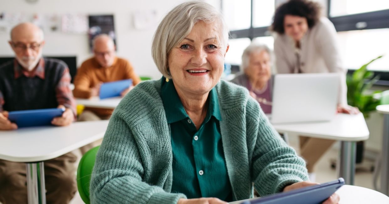 Seniors learning through hands-on activities.