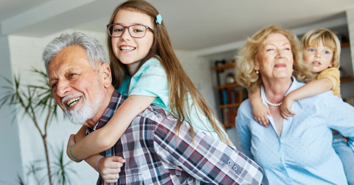 Grandparents watching their grandchildren.