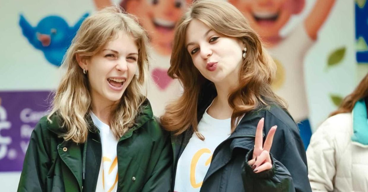 Two young volunteers at the RVC Center in Moldova.